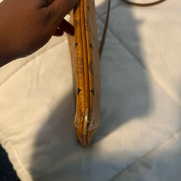 MCM crossbody has some wear in the bottom corners, not visible while wearing. - Picture 5 of 6